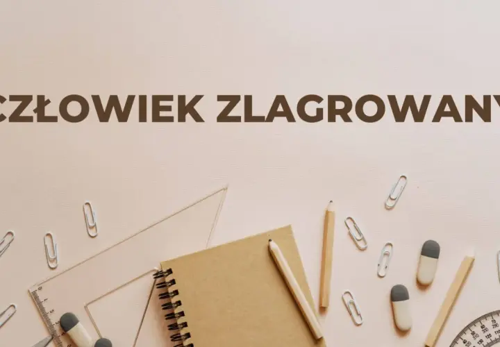 Człowiek zlagrowany, ofiara systemu, otoczony przyborami szkolnymi.